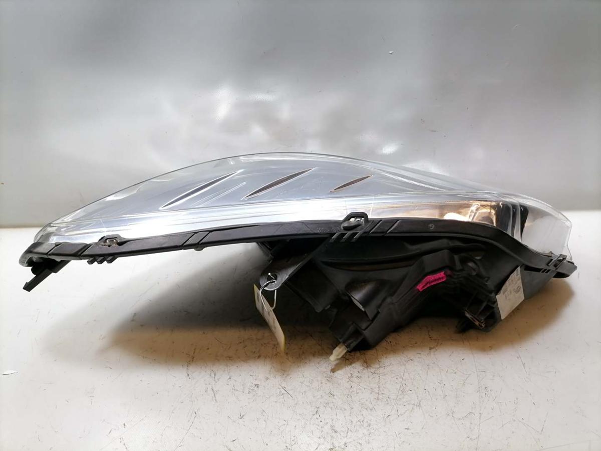 Dacia Sandero 1 original Scheinwerfer vorn links Halogen Bj.2012 Kratzer